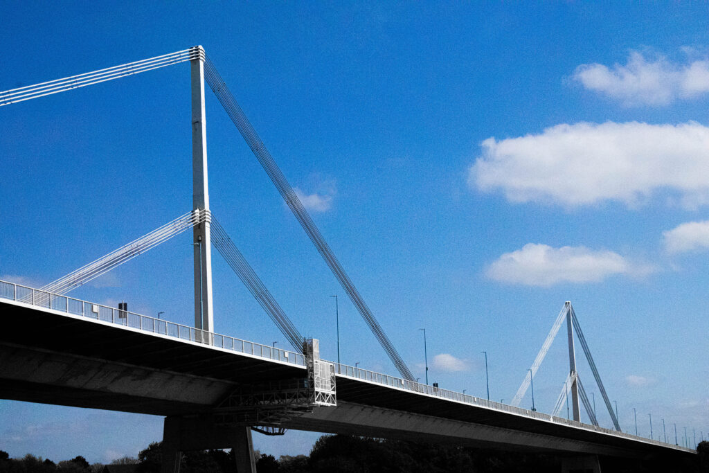 A picture of a large bridge with two spans visible