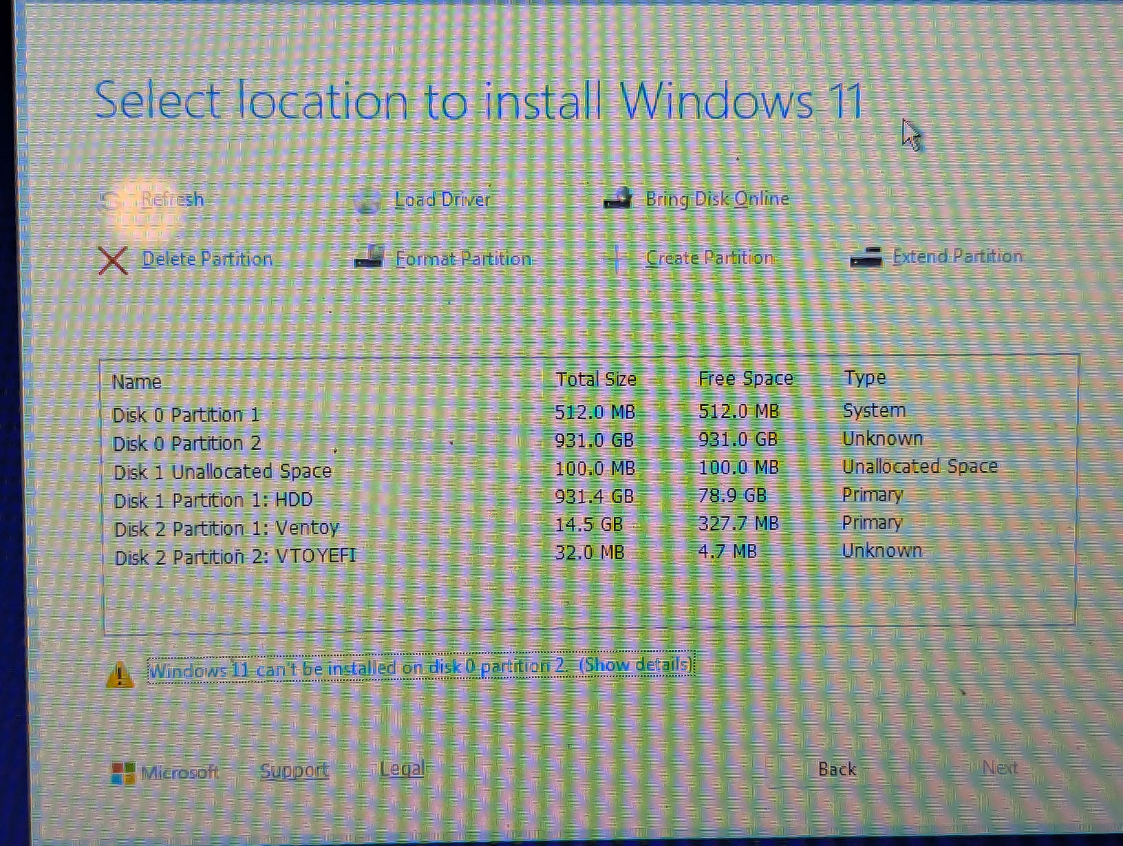 Select a location to install Windows 11. Disk 1 partition 2 is selected but Windows can't be installed there.