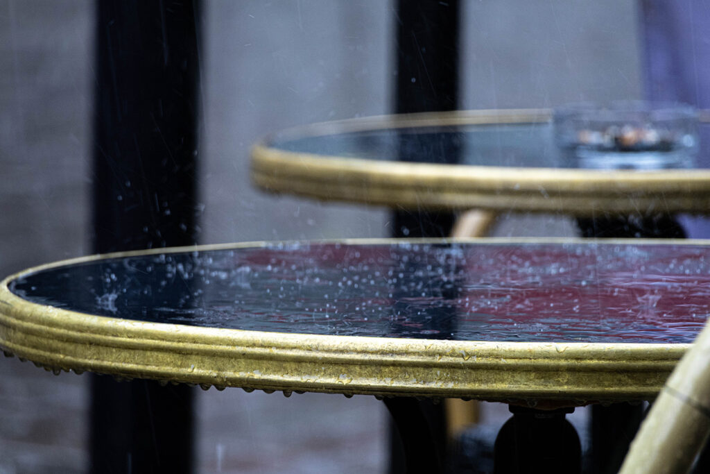 Rain pouring onto a table