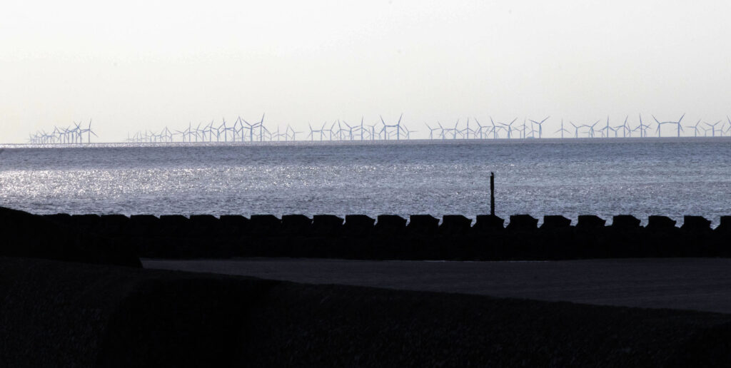 Picture of rows of windmills in the water